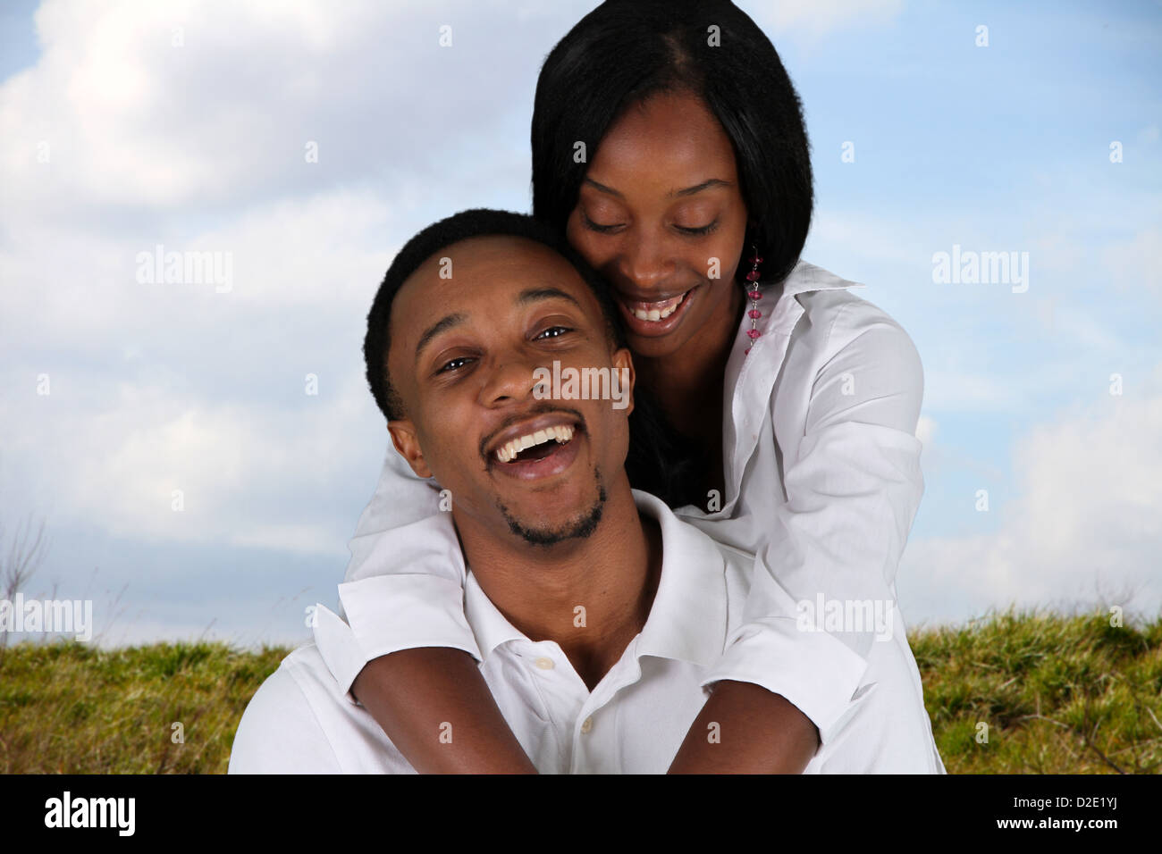 Man and woman posing together outside in nature Stock Photo - Alamy