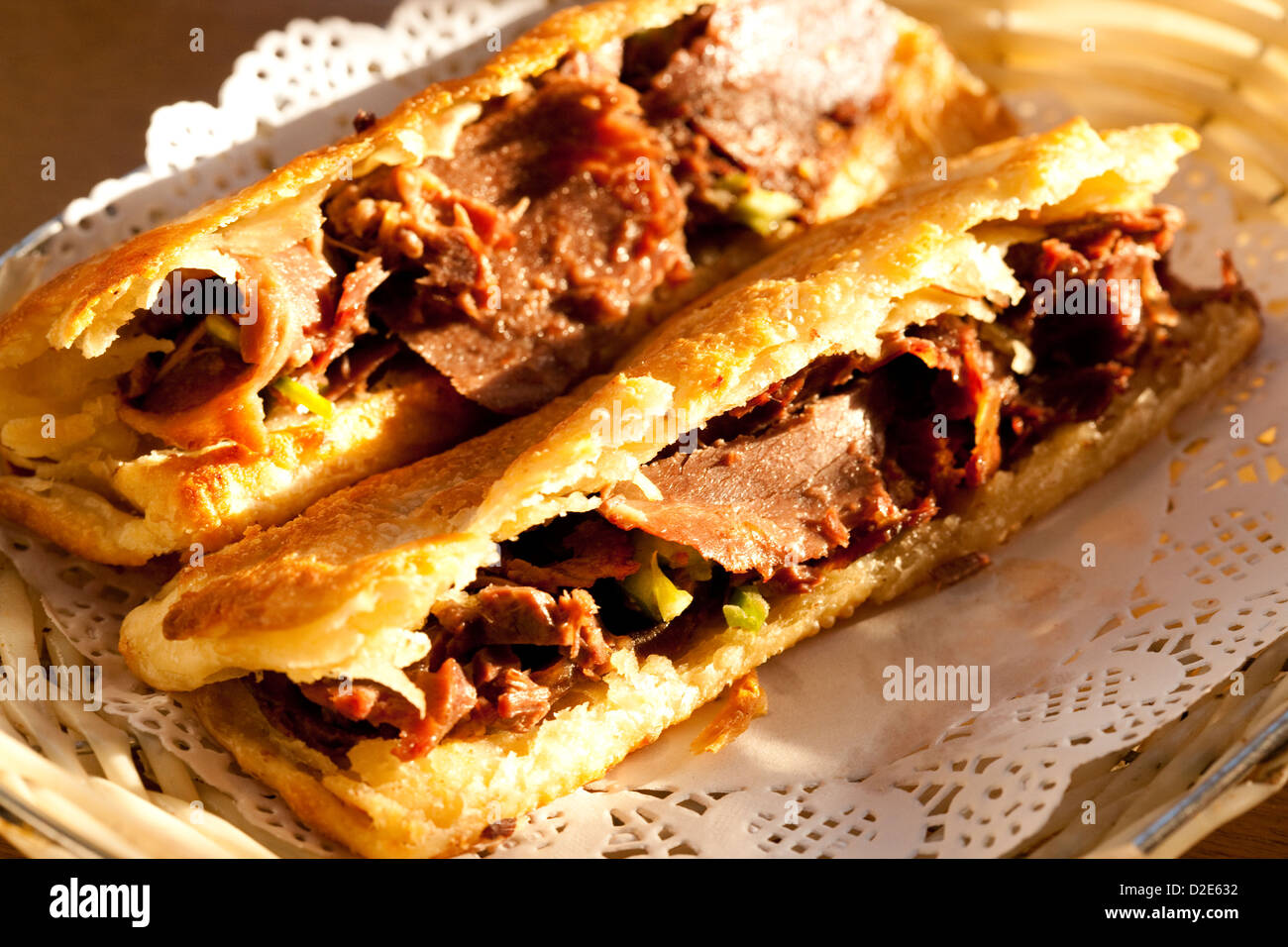 Chinese traditional food baked cake of donkey meat Stock Photo Alamy