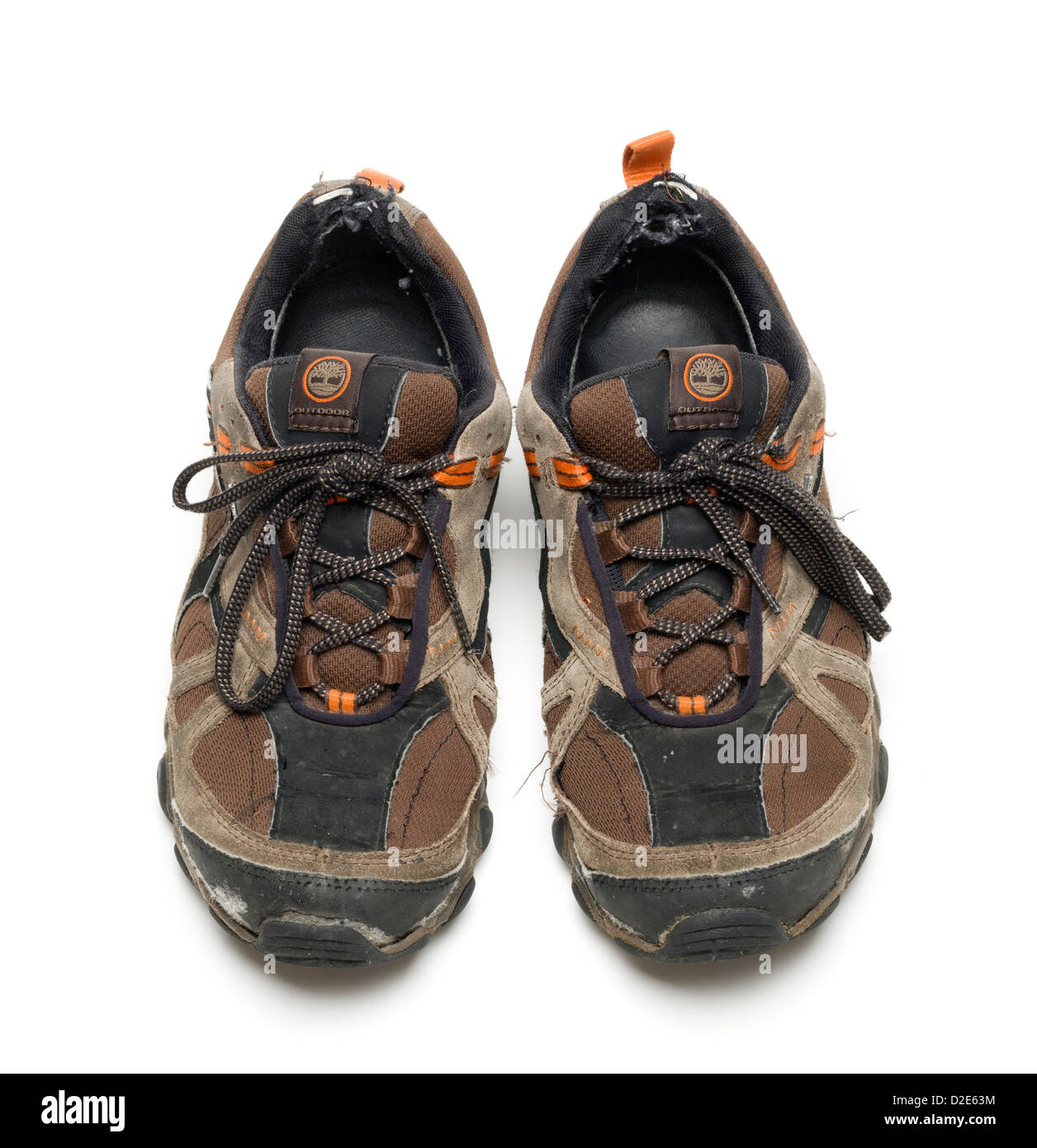 One pair of worn out brown Timberland hiking shoes Stock Photo - Alamy