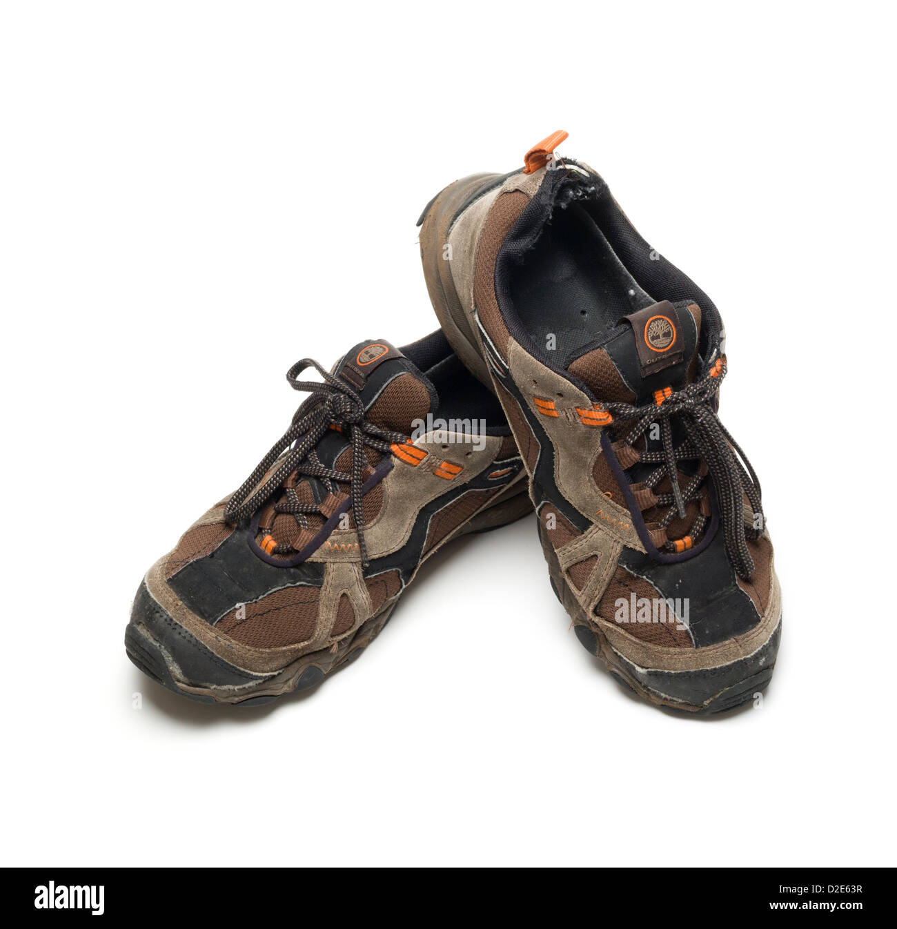 One pair of worn out brown Timberland hiking shoes Stock Photo - Alamy