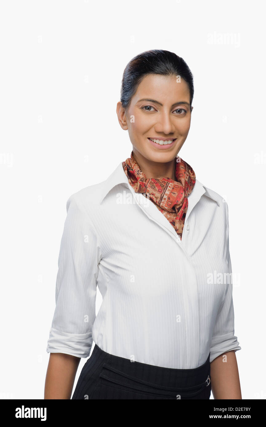 Close-up of an air hostess smiling Stock Photo