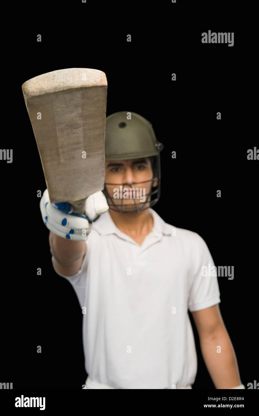 Hand holding cricket bat hires stock photography and images Alamy