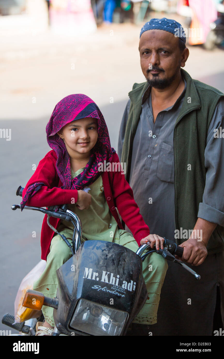 Muslim father and daughter, Ahmedabad, Gujarat, India Stock Photo