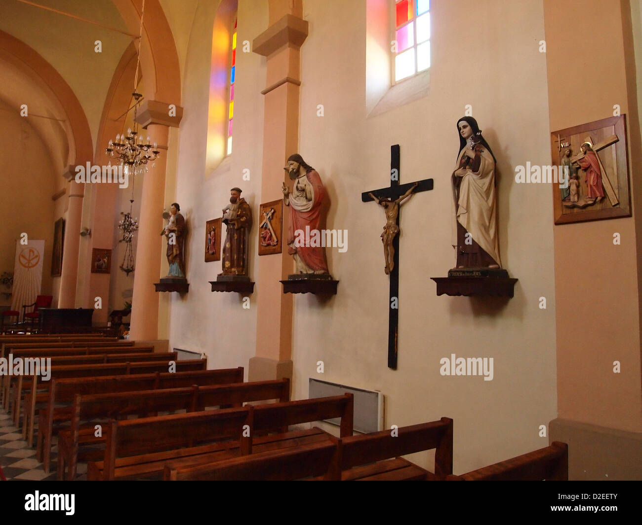Statues on a wall in a church Stock Photo Alamy