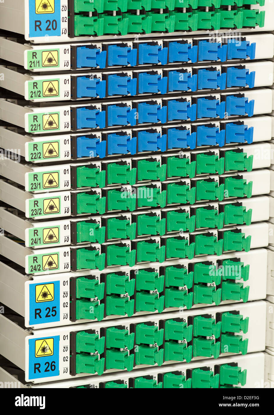 fiber optic cable management system with green and blue SC connectors Stock Photo Alamy