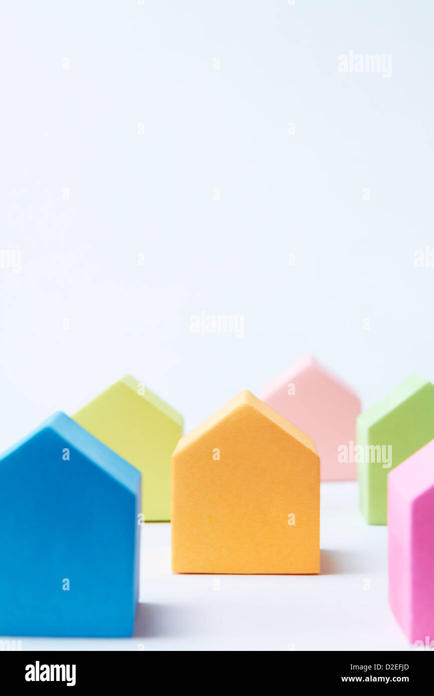 Colorful House Shaped Blocks On White Background Stock Photo