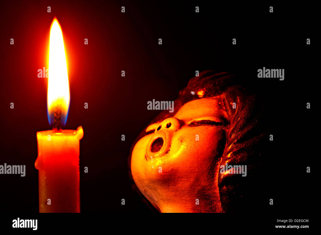 angel with candle Stock Photo Alamy