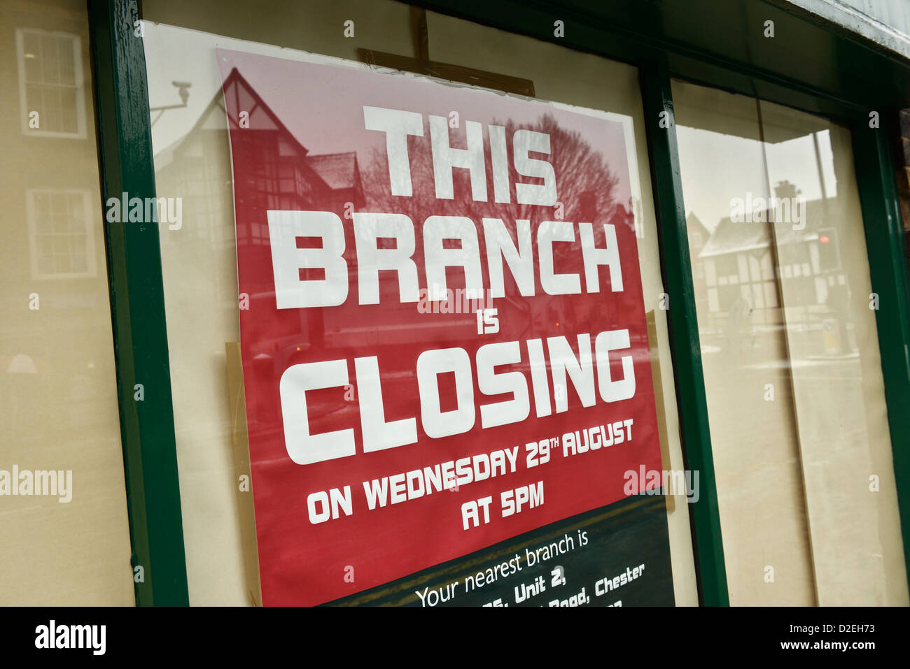 Closing down notice in a shop window Stock Photo