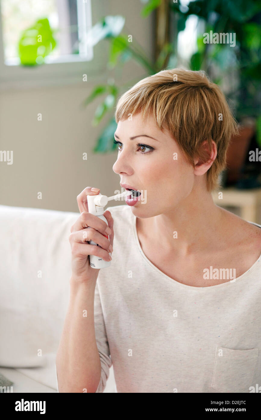 Using Mouth Spray Medicinal throat spray hi-res stock photography and images - Alamy