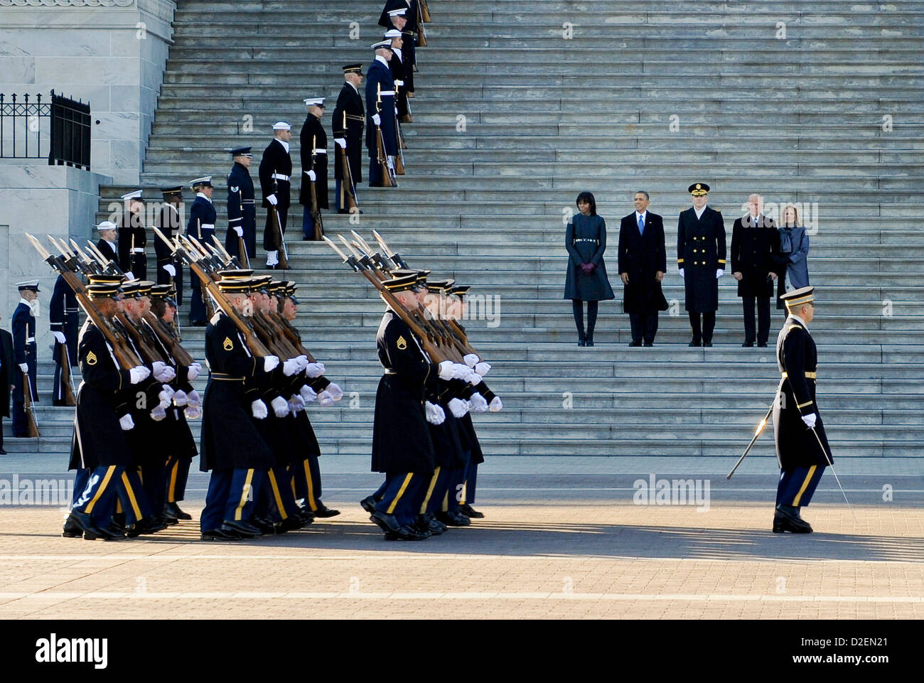 The US Army honor guard perform a pass and review as President Barack Obama, First Lady Michelle Obama, Vice President Joe Biden and wife Jill Biden depart the US Capitol for the Inauguration Parade down Pennsylvania Avenue to the White House January 21, 2013 in Washington, DC. Stock Photo