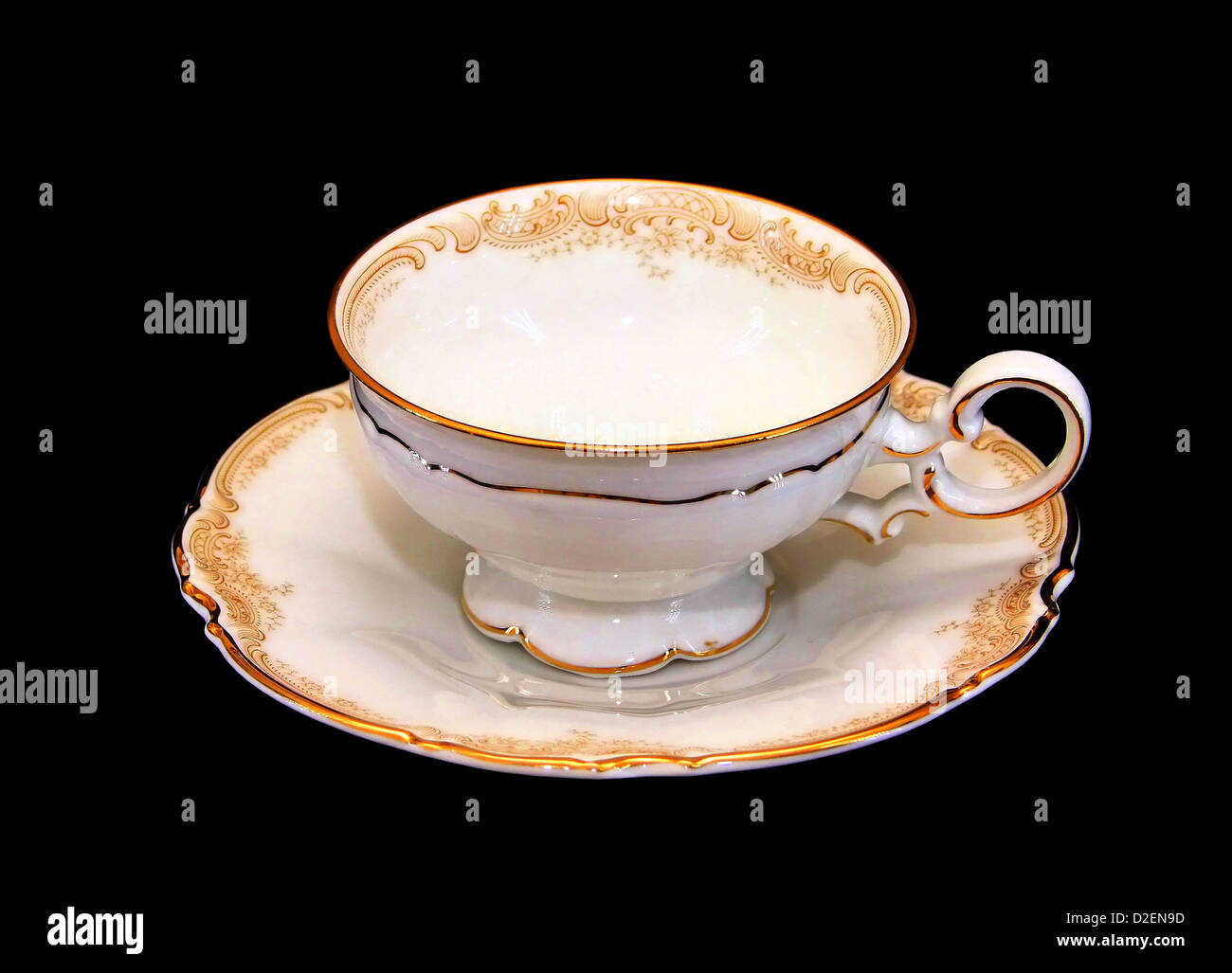 Isolated Expensive Porcelain Teaset Cup and Saucer with Golden Brim