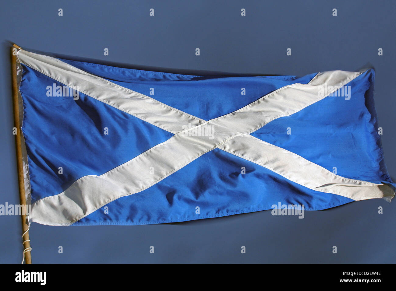 The St. Andrews Cross, the national flag of Scotland, seen against a dark sky Stock Photo