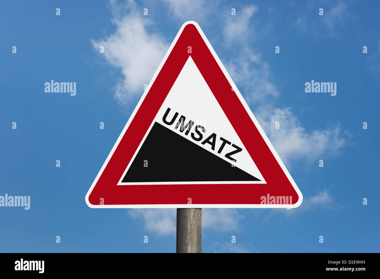 Detail photo of a danger sign 'Steep hill downwards' with the German inscription volume of sales Stock Photo