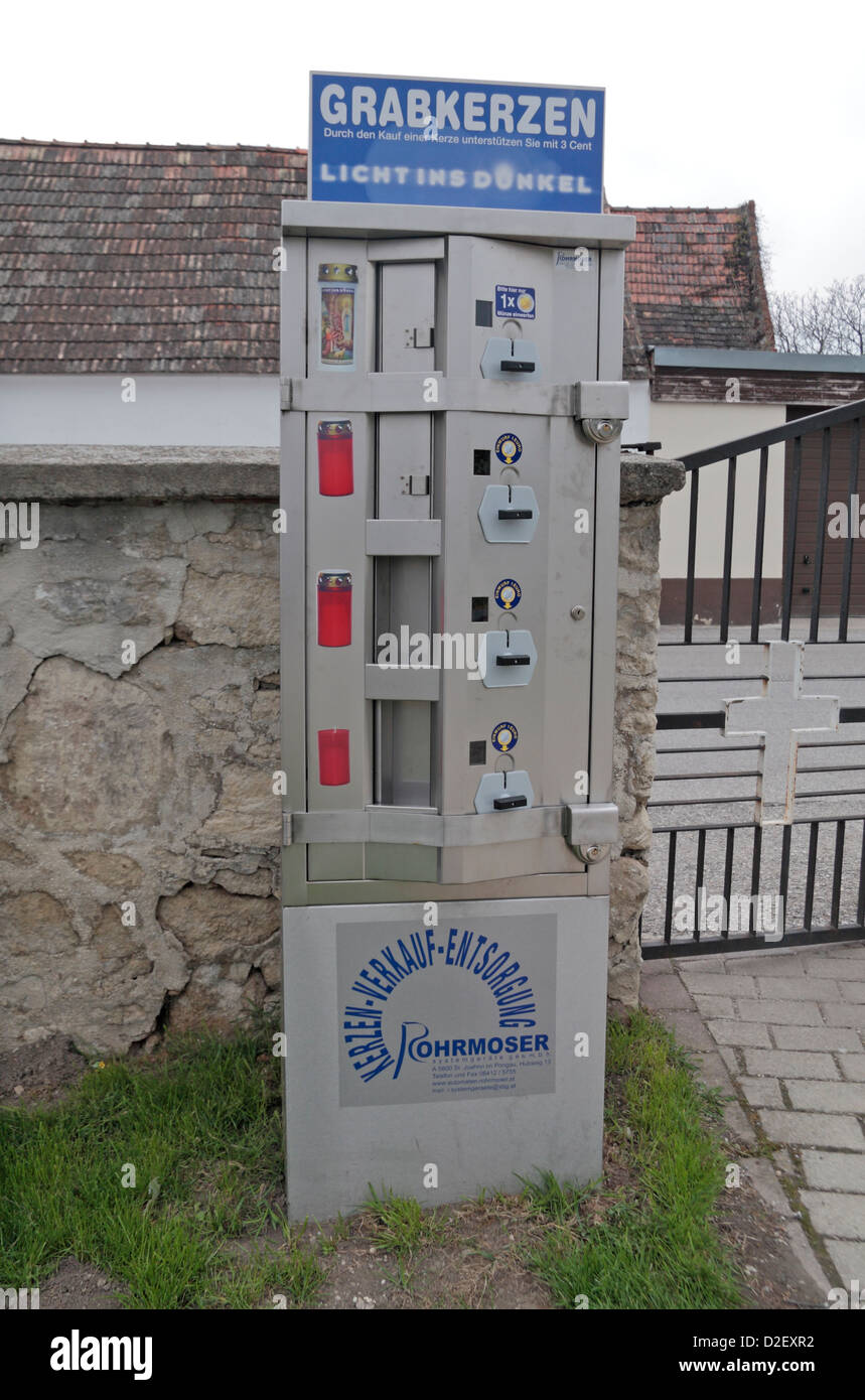 An automated candle dispensing machine in a typical Austrian cemetery in Trausdorf, nr Vienna, Austria. Stock Photo