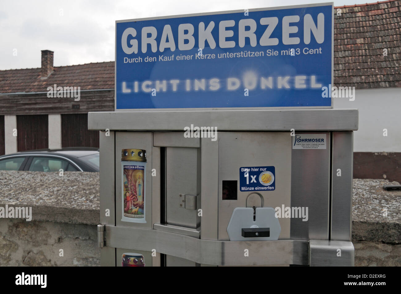 An automated candle dispensing machine in a typical Austrian cemetery in Trausdorf, nr Vienna, Austria. Stock Photo