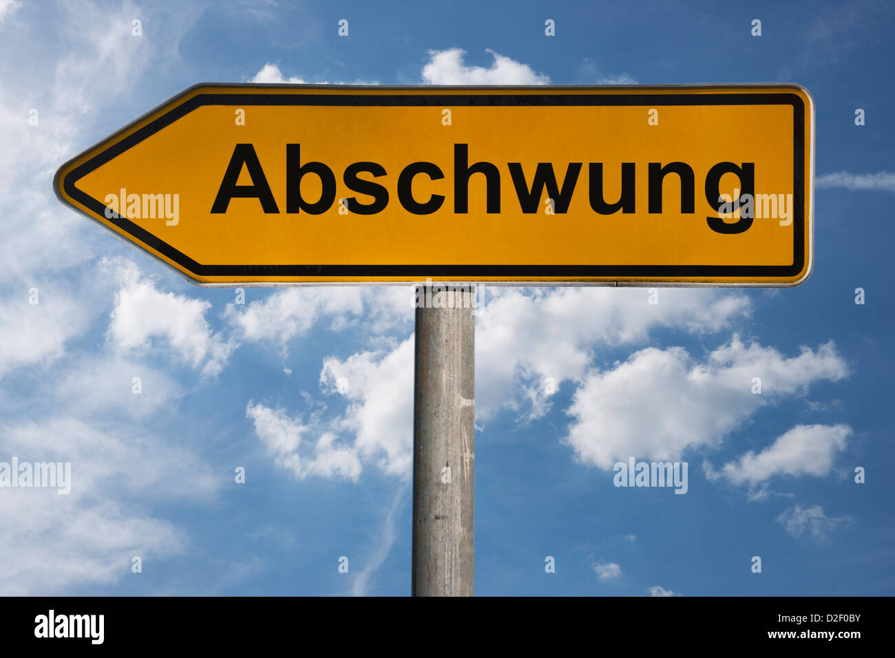Detailansicht eines Wegweisers mit der Aufschrift Abschwung | Detail photo of a signpost with the German inscription downturn Stock Photo