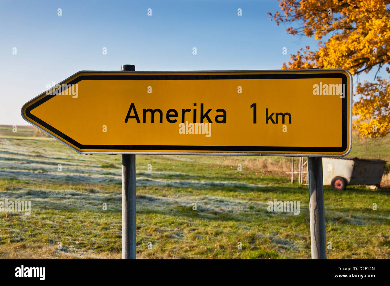 A signpost shows directory Amerika, 1 kilometer. America is the smallest locality of Penig, Saxony, Germany, Europe Stock Photo