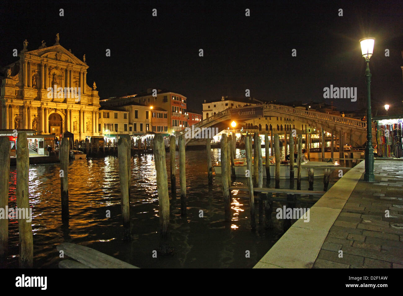 Scalzi Church and the Scalzi Bridge on the Grand Canal Venice Italy at nighttime Stock Photo