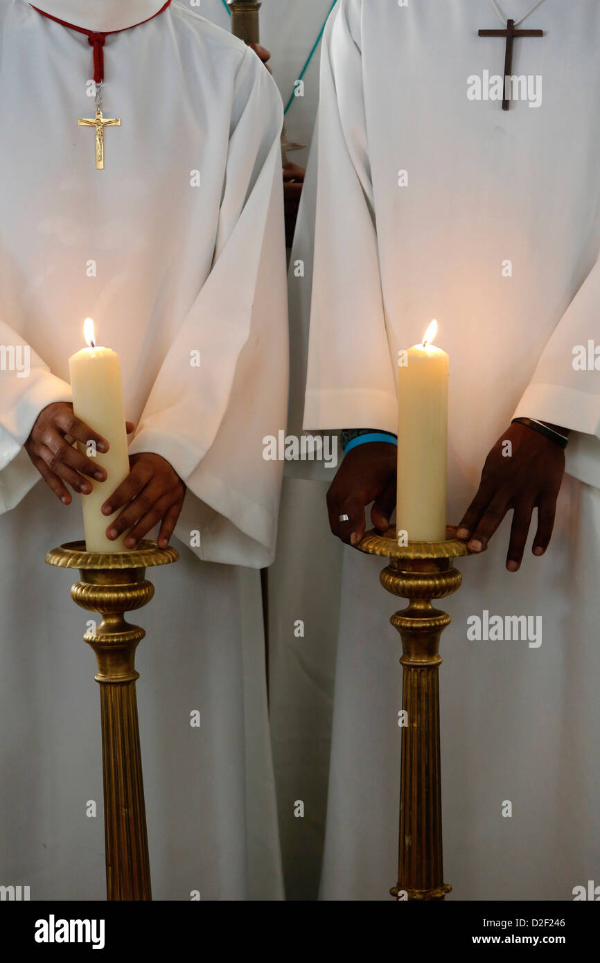 Catholic altar boys holding church candles Stock Photo Alamy