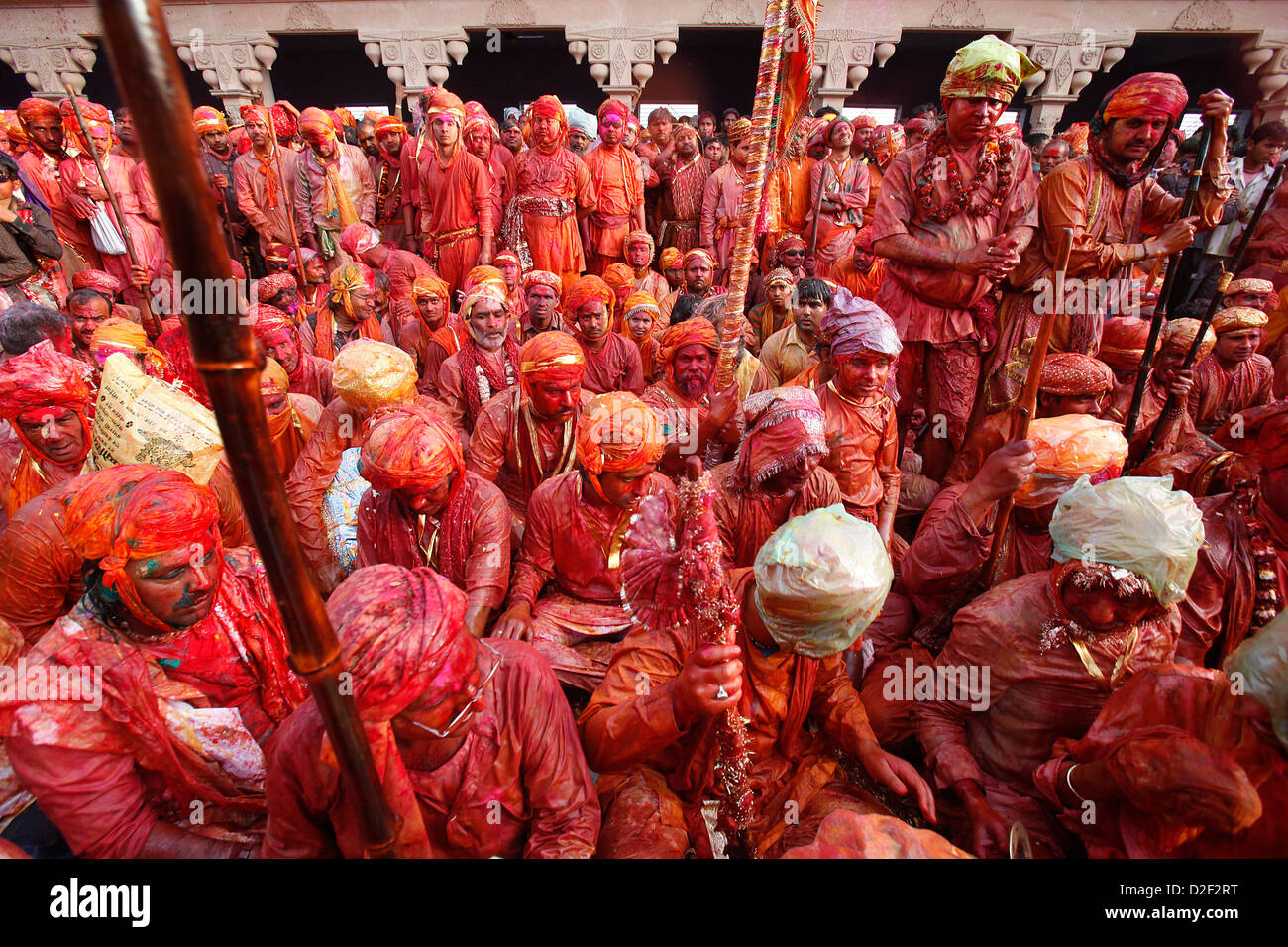 Barsana villagers celebrating Holi in Nandgaon Nandgaon. India. Stock Photo