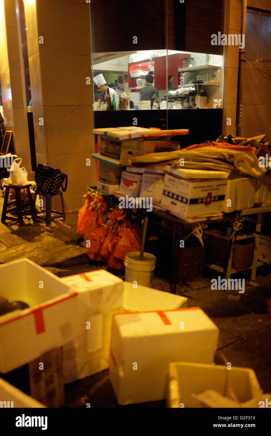 Hong Kong, China, with garbage in front of a restaurant overlooking the kitchen Stock Photo