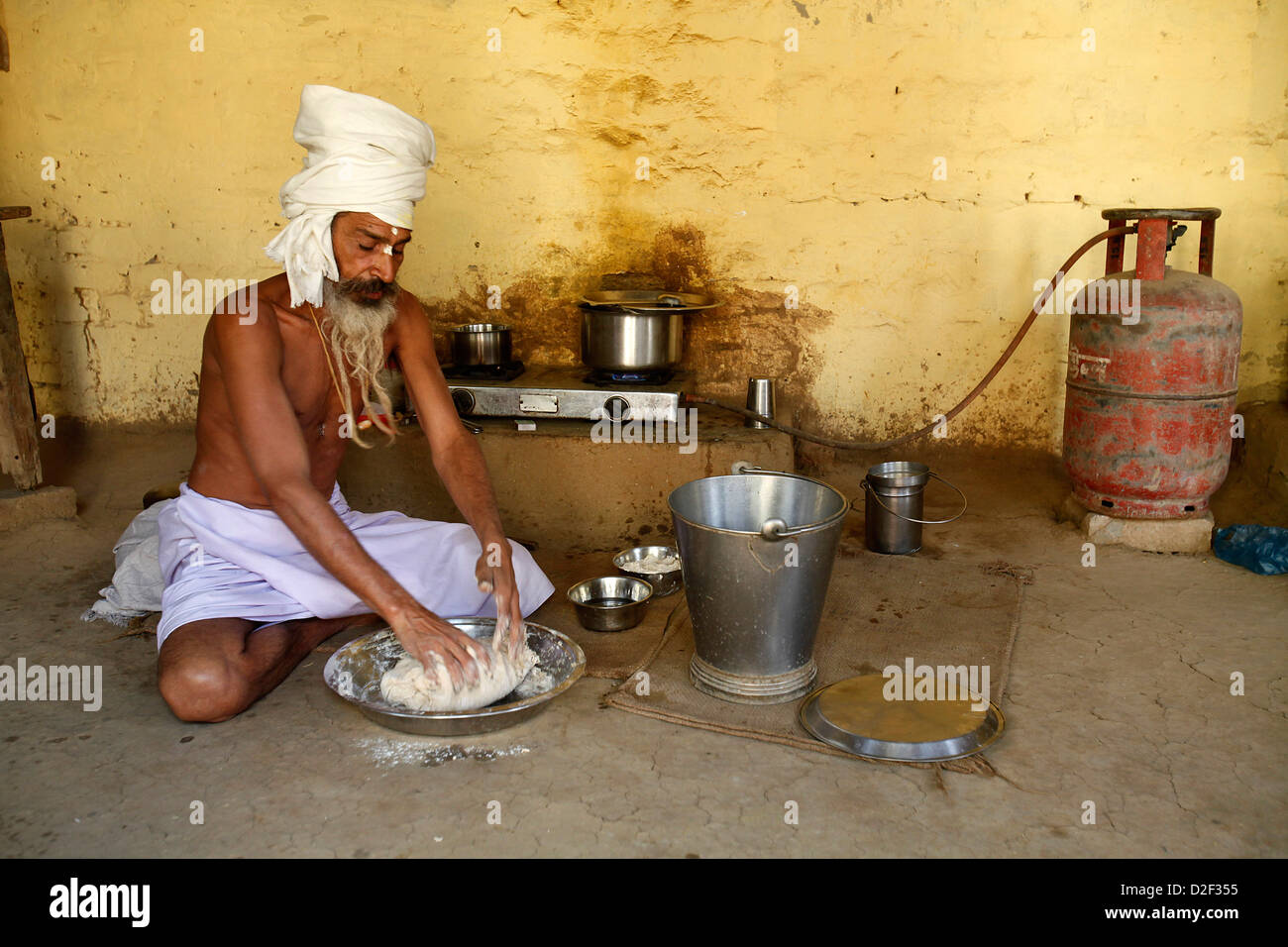 Monastic kitchen. The temple is located on the Goverdan Parikrama pilgrimage trail Goverdan. India. Stock Photo