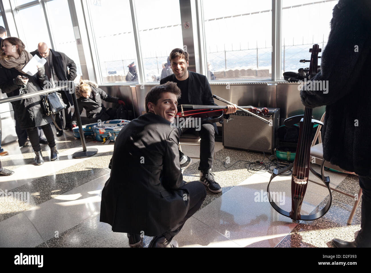 ]2CELLOS Stjepan Hauser Luka Sulic at the Empire State Building's 86th floor Observatory here in New York City, New York, USA. Stock Photo