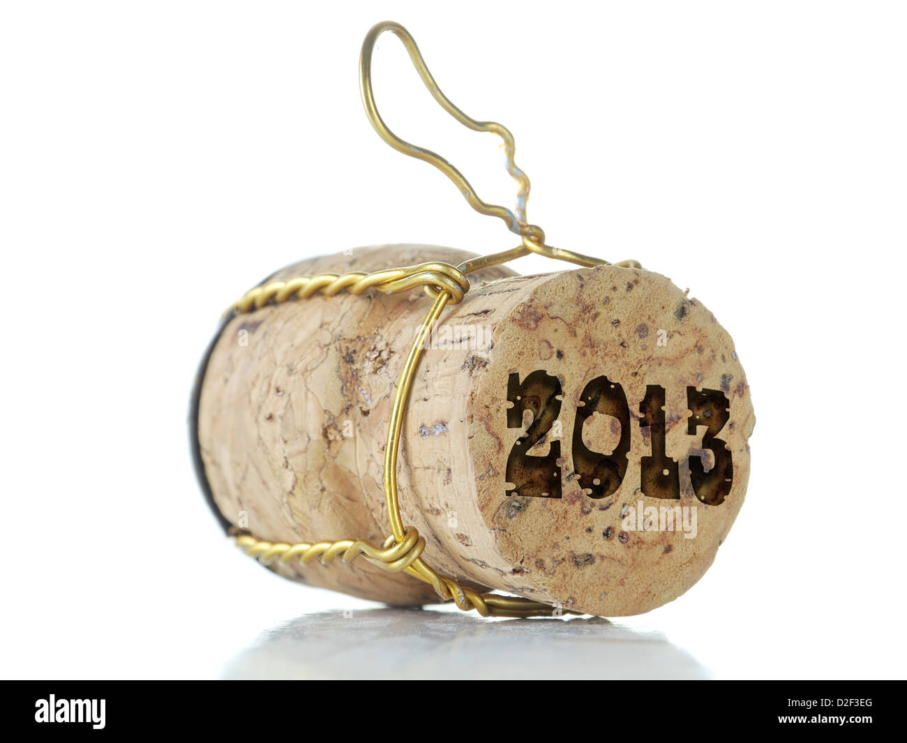 Champagne cork with imprinted 2013 year digits over white background Stock Photo
