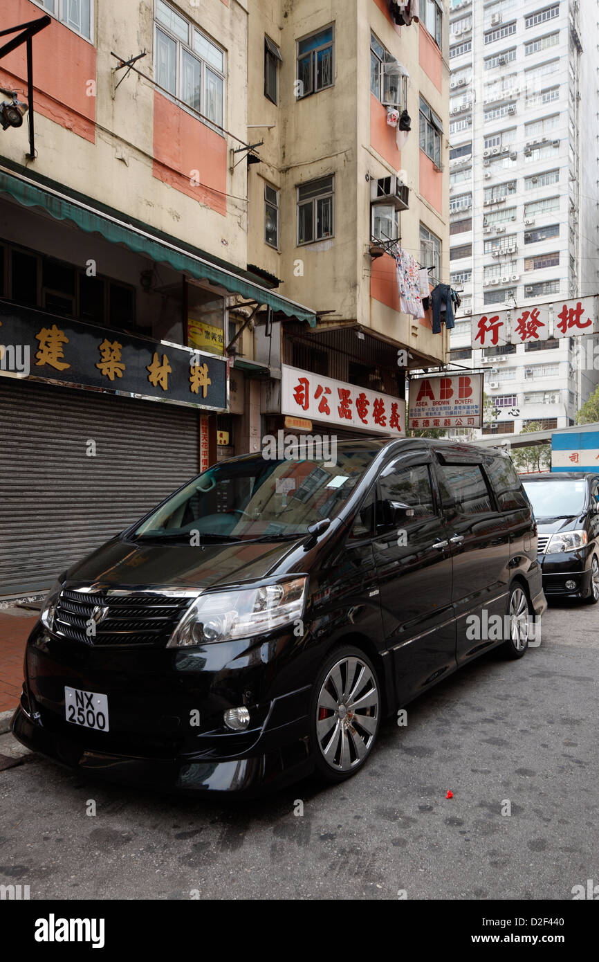 Hong Kong, China, black van with alloy wheels and front bumper in Hong
