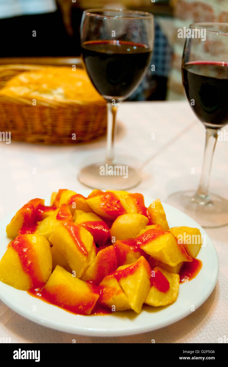 Spanish appetizer: patatas bravas serving, close view. Madrid, Spain. Stock Photo
