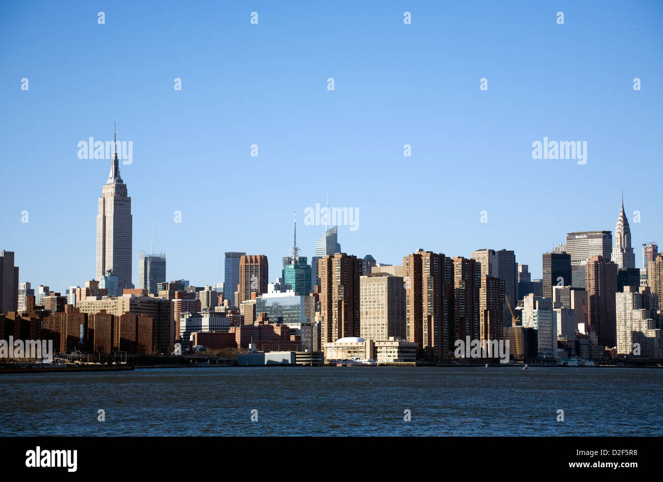 Manhattan skyline, including Empire State Building, Chrysler Building, Met Life and East River, New York, NY, USA Stock Photo