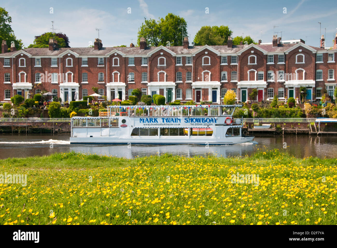 Mark Twain Tourboat on The River Dee in Spring from The Meadows, Chester, Cheshire, England, UK Stock Photo