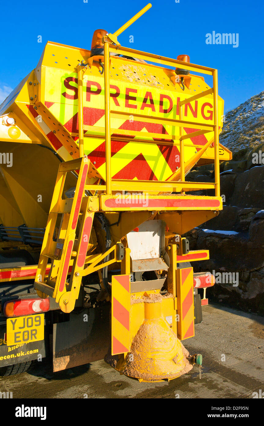 Grit spreader on a cold bright winter day,Blackpool,Lancashire,UK Stock Photo