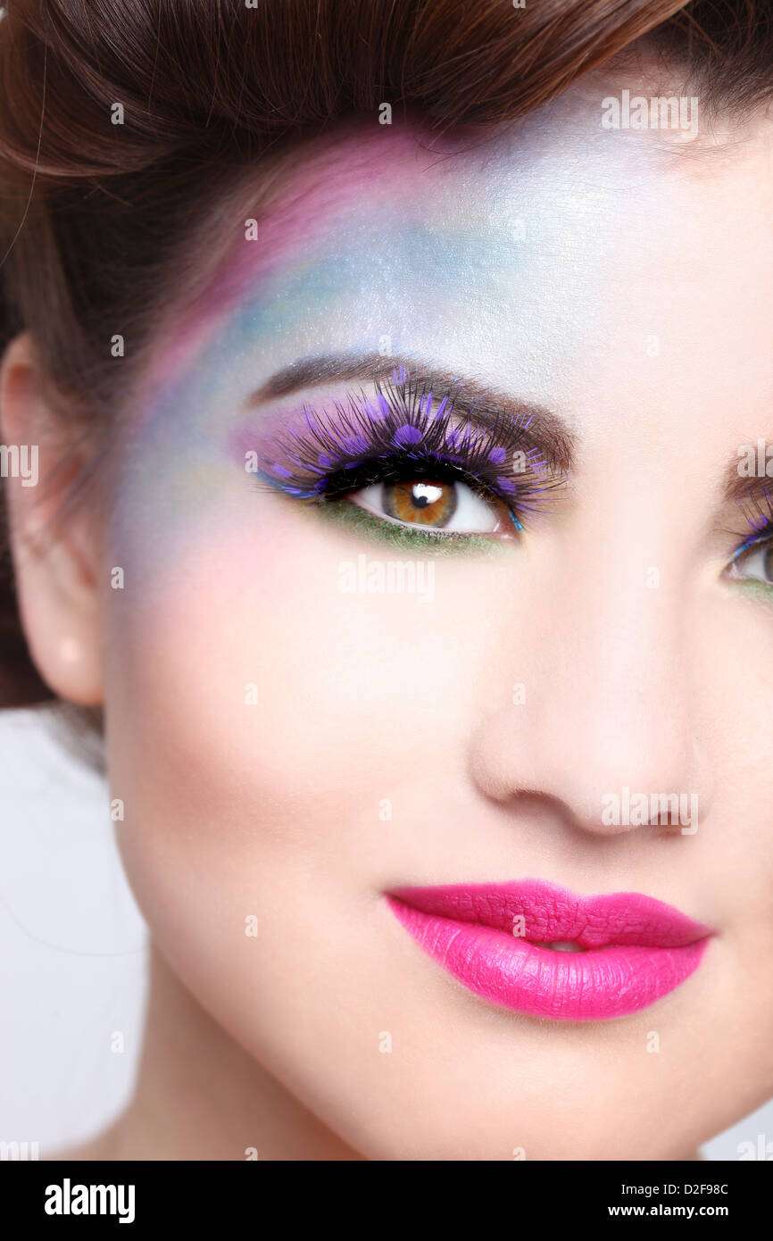 Woman With Colorful Creative Cosmetics on White Stock Photo
