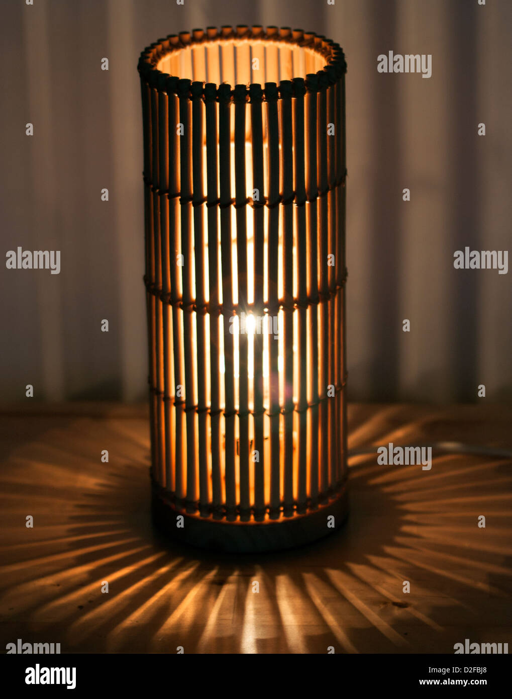 Lit Table lamp with reflective patterns Stock Photo