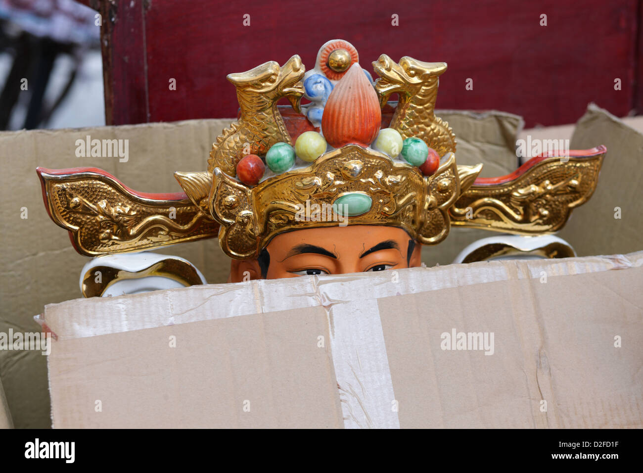 Shenzhen, China, is a figure in a torn cardboard in costumes of Chinese Ope Stock Photo