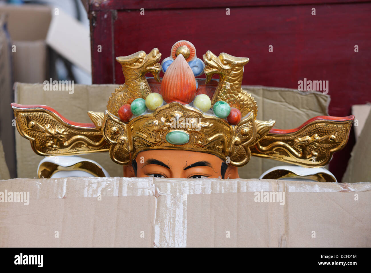 Shenzhen, China, is a figure in a torn cardboard in costumes of Chinese Ope Stock Photo