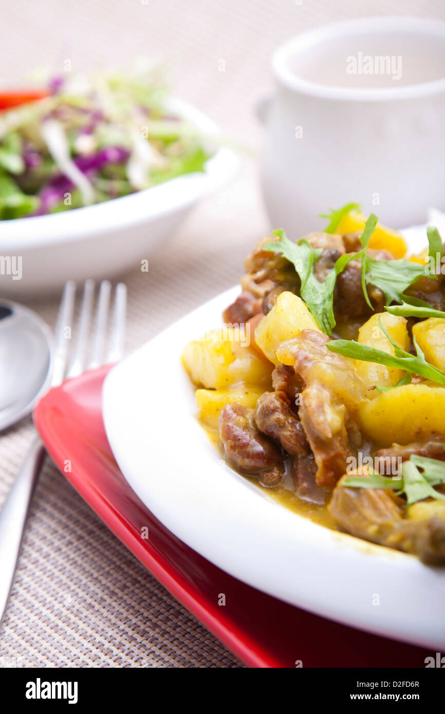 Beef Stew with potatos on plate. Stock Photo