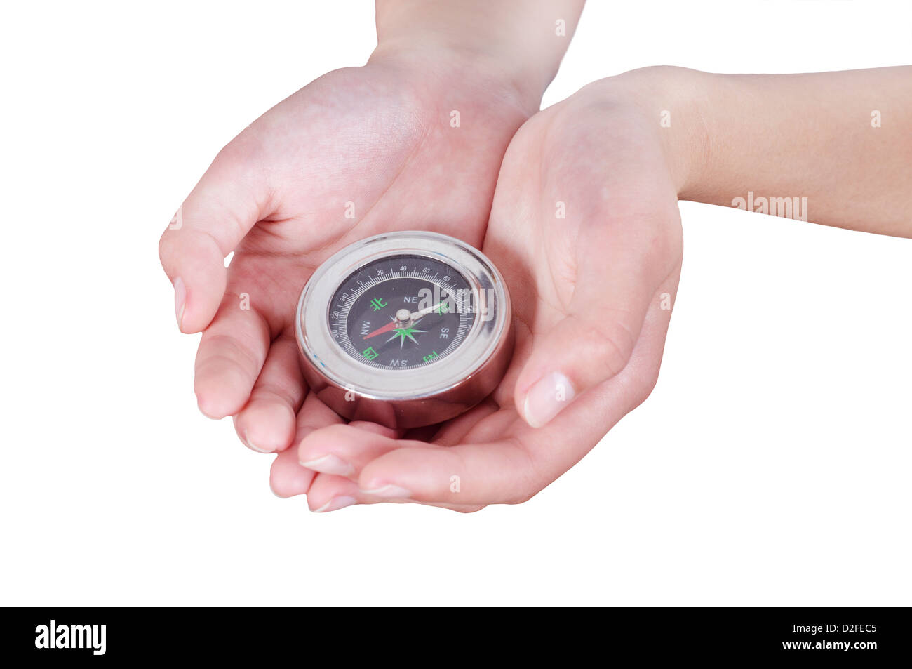 Woman the hands holdinbothhands compass. Stock Photo