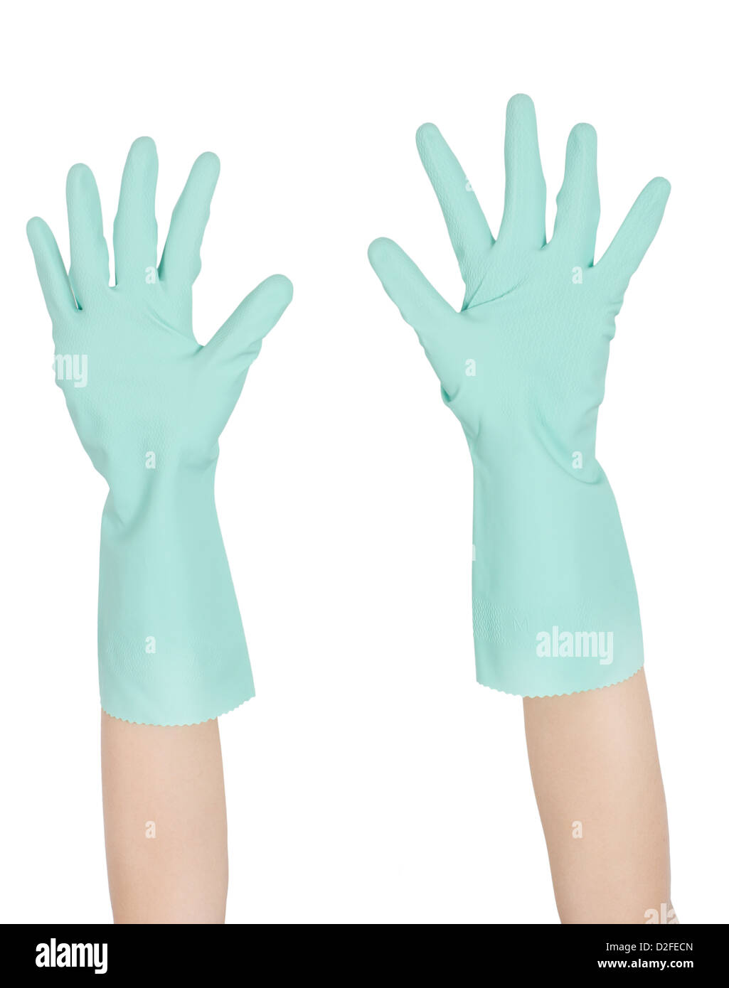 The woman's hands with rubber gloves Stock Photo