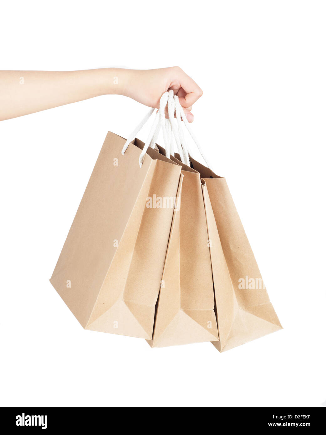 The hand of a woman carrying shopping bags Stock Photo