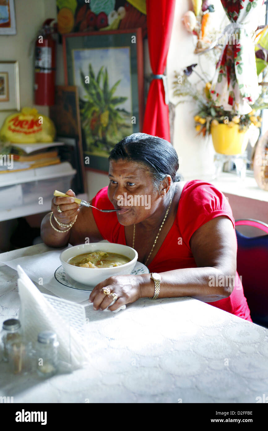 Eating Bull Foot Soup, Harvey's Restaurant, Christiansted, St. Croix, US Virgin Islands, Caribbean Stock Photo
