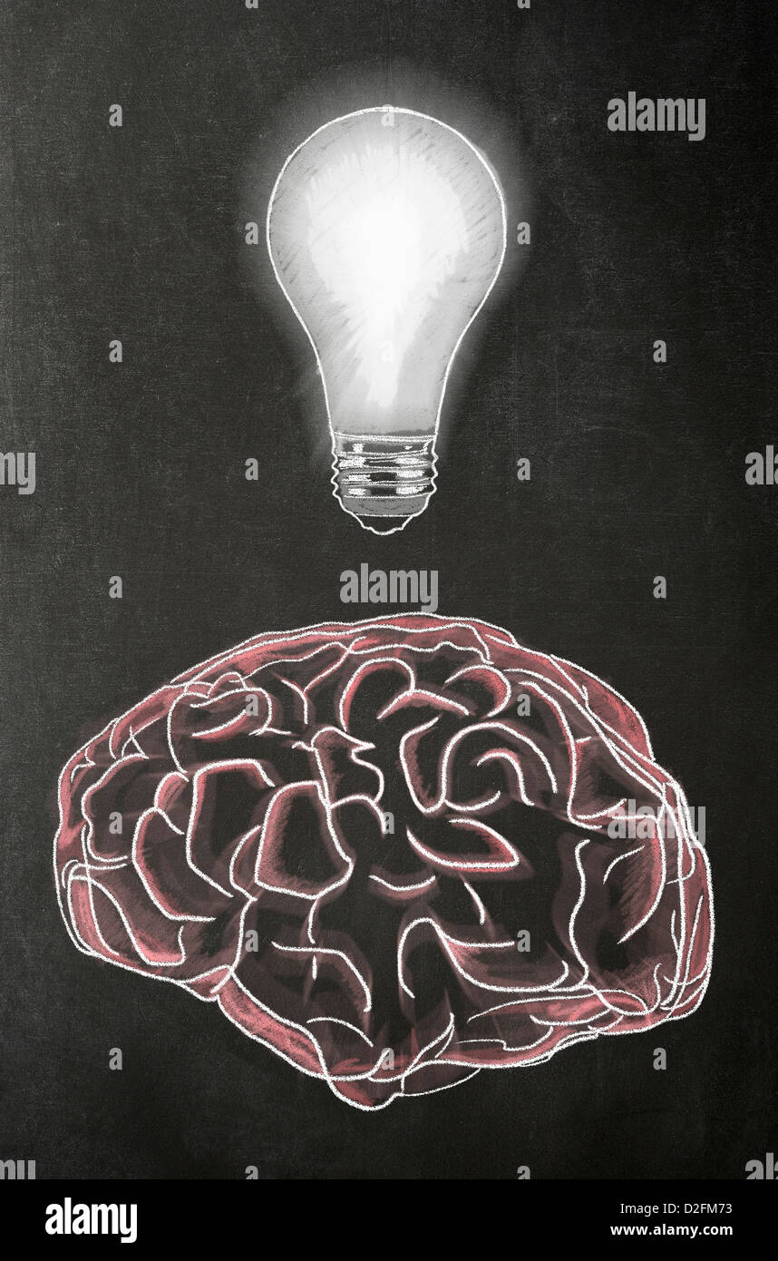 Ideas - Brain with a light bulb above it on a blackboard Stock Photo