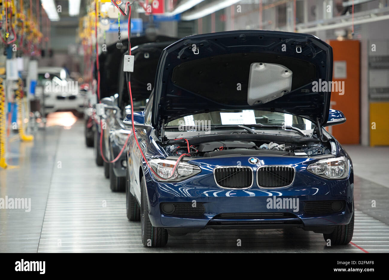 BMW vehicles on the production line on Wednesday, 7 March 2012, at the BMW factory in Regensburg. Due to a sales record in 2011, the profit of the Bavarian automobile producer also rised in unknown hights. Stock Photo