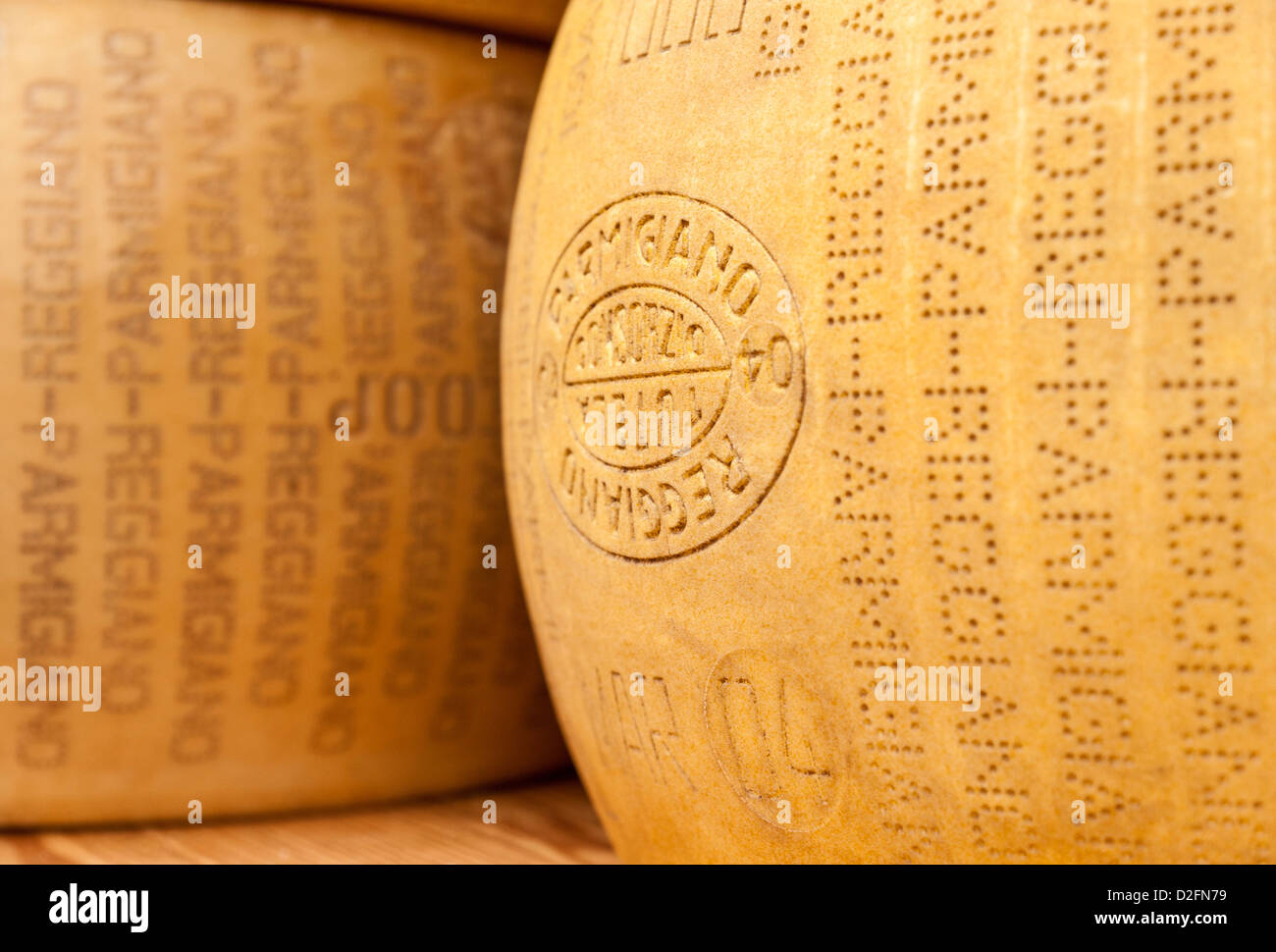 Close up of large wheels of Parmesan Cheese Stock Photo