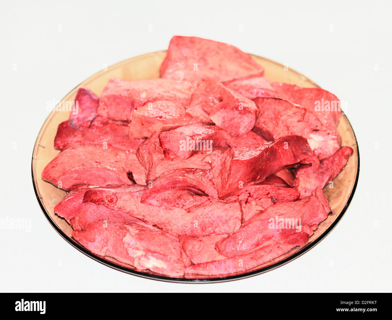 meat on a dark plate Stock Photo