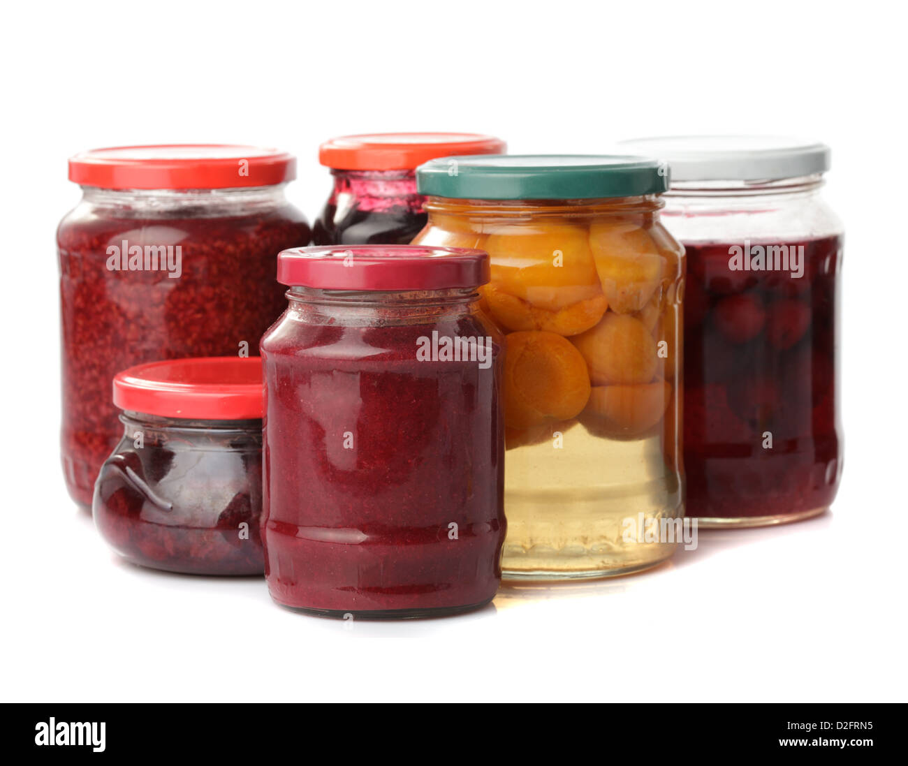 Sweet preserves as jams and compotes isolated on white Stock Photo Alamy