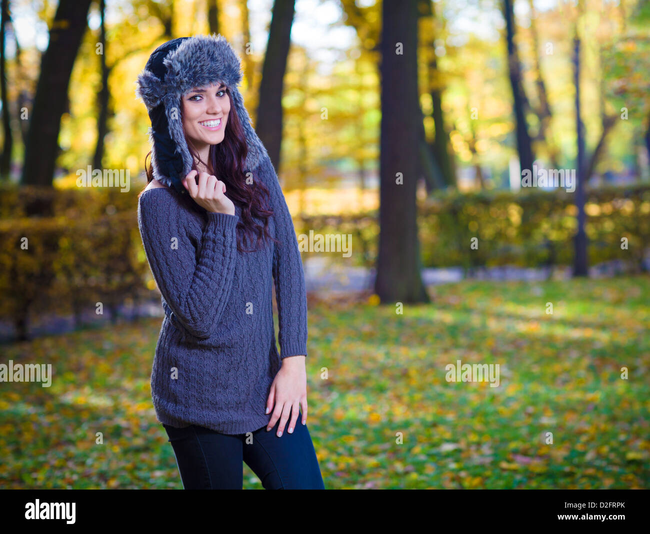 Cute woman posing in park Stock Photo