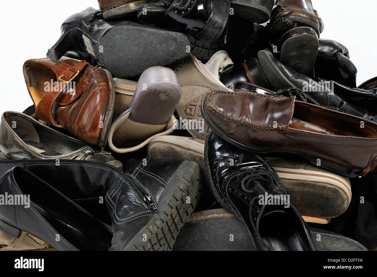 Heap of old used shoes Stock Photo