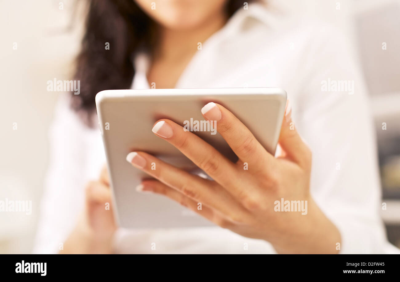 Corporate woman with portable tablet pc on her hand Stock Photo